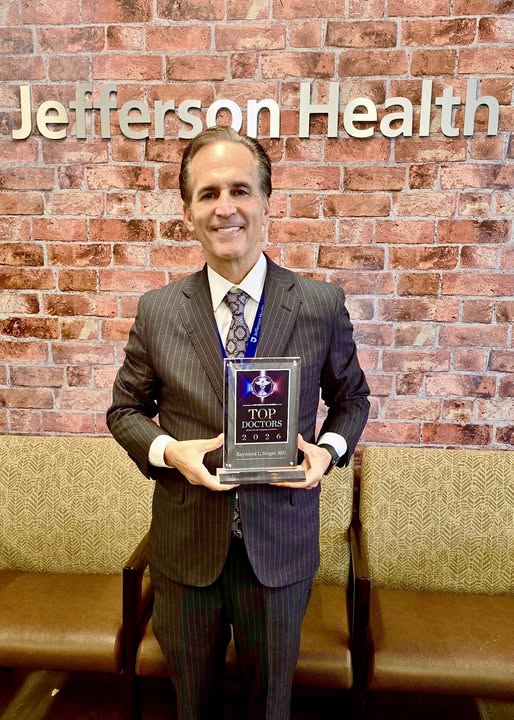 Dr. Raymond Singer after receiving recognition as a 2026 Top Doctor in Cardiac Surgery, celebrating teamwork and excellence in patient care.